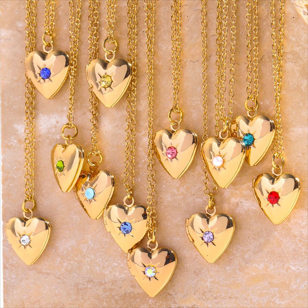 Wholesale December birthday stone heart-shaped opening and closing album necklace