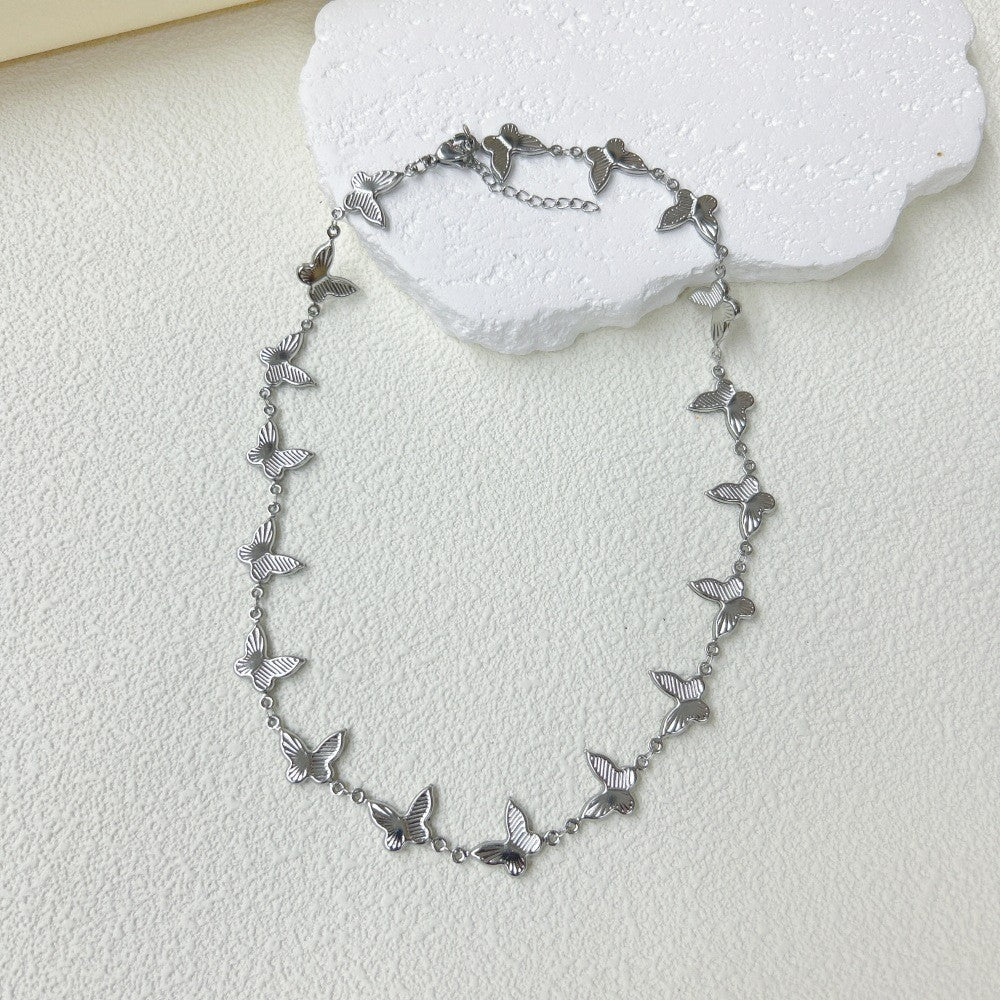 Wholesale  stainless steel three-dimensional hollow butterfly bracelet necklace suit