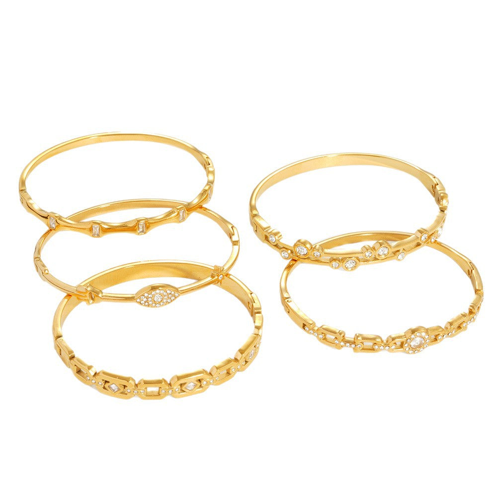 Wholesale Titanium Steel Geometric Starburst Bangle with Inlaid Diamonds