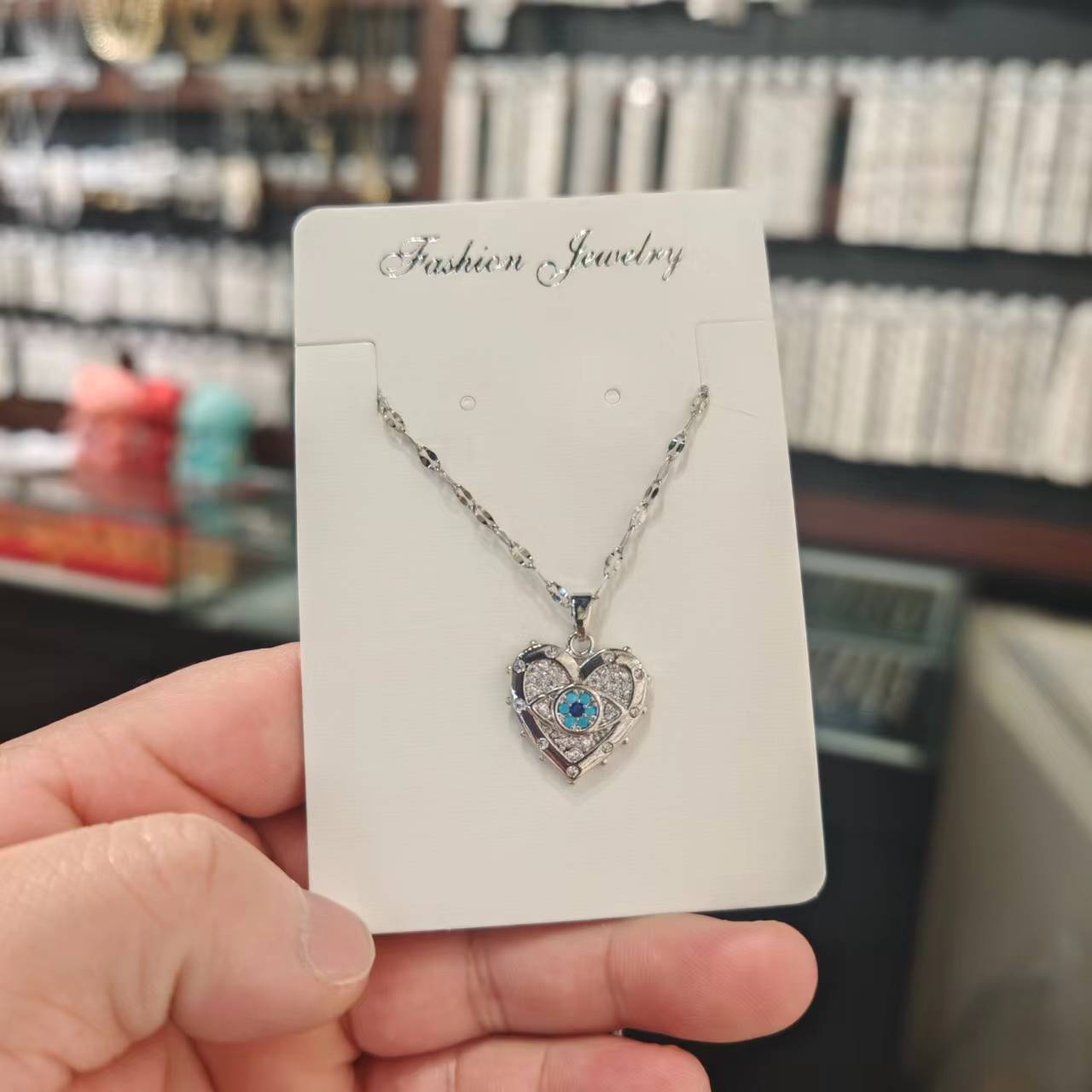 Wholesale Titanium Steel Devil's Eye Love Necklace