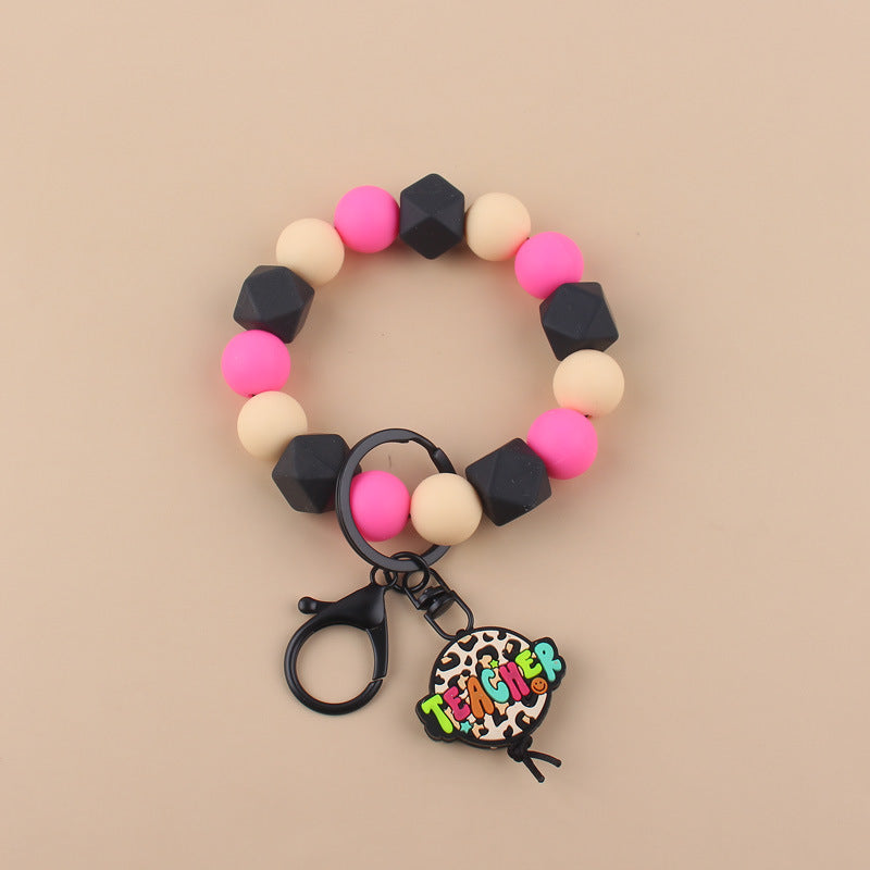 Wholesale Cartoon Apple Teacher Pencil Silicone Beaded Wrist Keychain