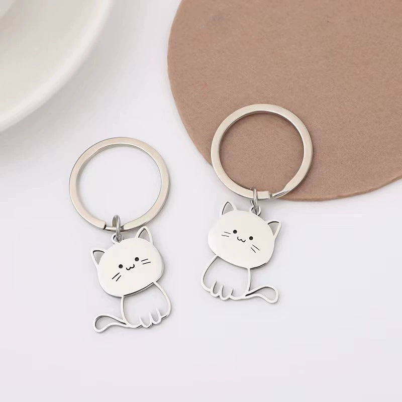 Wholesale  fish kat eating fish titanium steel keychain