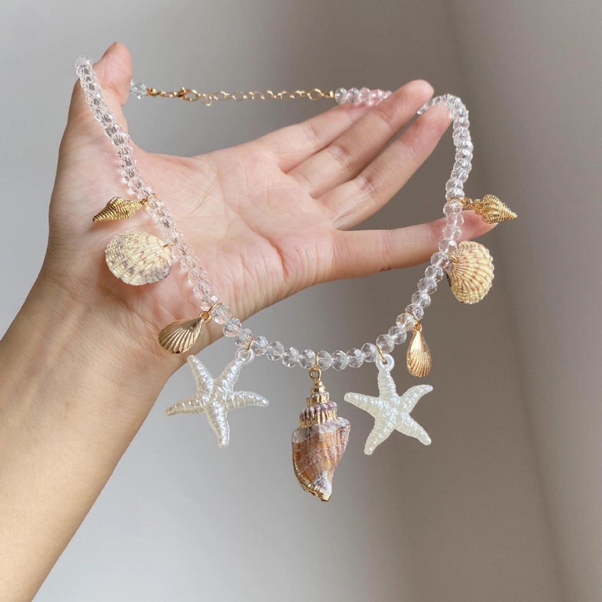 Wholesale starfish conch and seashell necklace