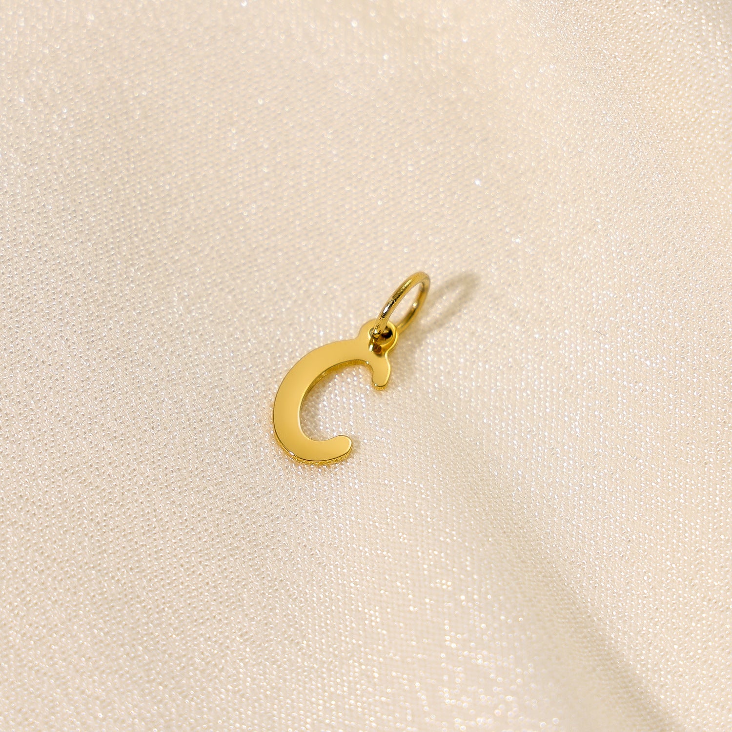 Wholesale 26 English letters stainless steel letter pendant