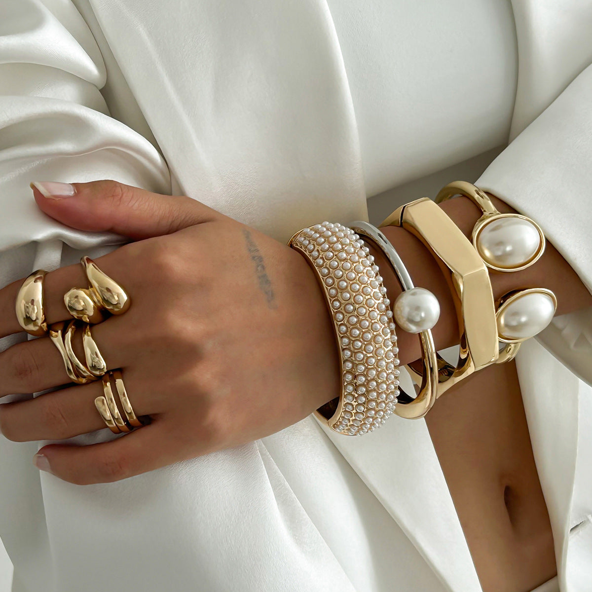 Wholesale Open cut edge elliptical two-color alloy Bracelet set