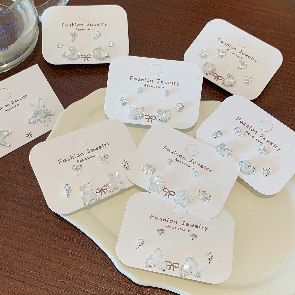 Wholesale Broken shells cat starfish earrings set silver needle heart bow earrings