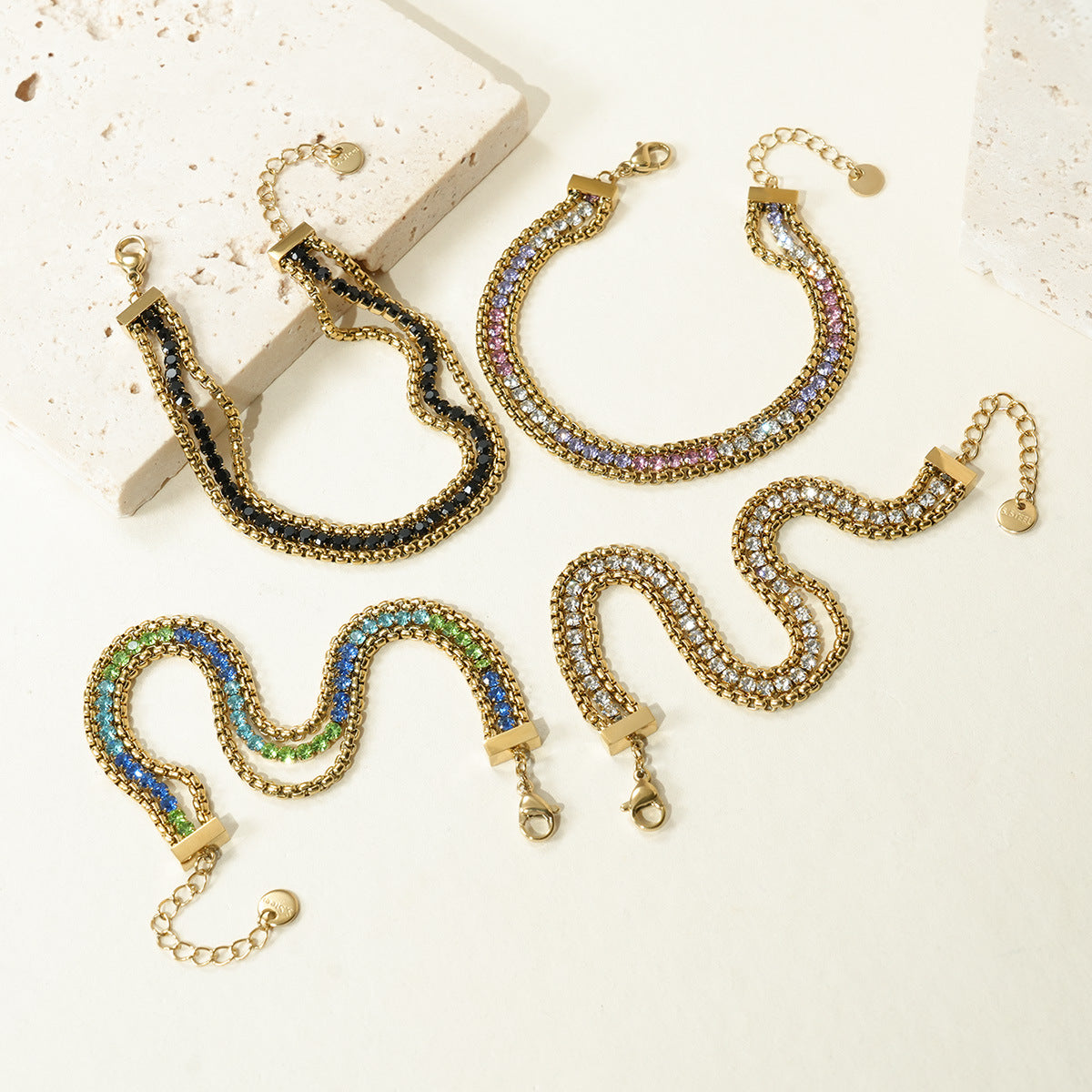 Wholesale Stainless steel bracelet with multiple layers and diamond embellishments.