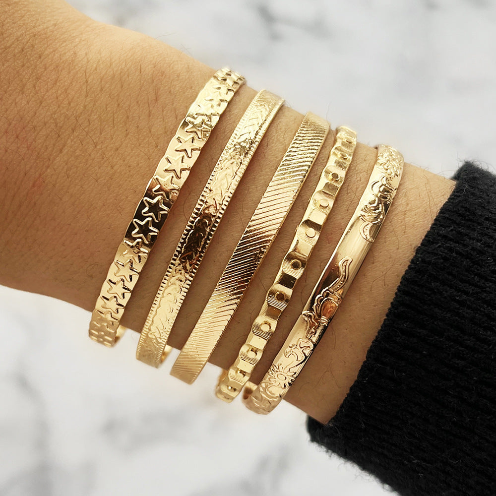 Wholesale  4pcs/set love flower pattern exaggerated personality bracelet