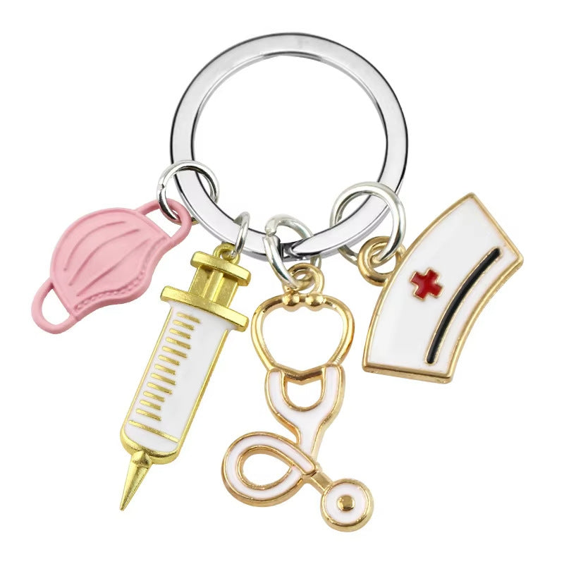 Wholesale Metal Nurse Medical Keychain Pink Stethoscope Cross Design Gift Bag Charm Decorative Accessory