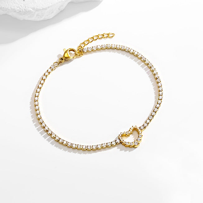 Wholesale Titanium steel heart-shaped necklace earrings and bracelet set inlaid with zircon.