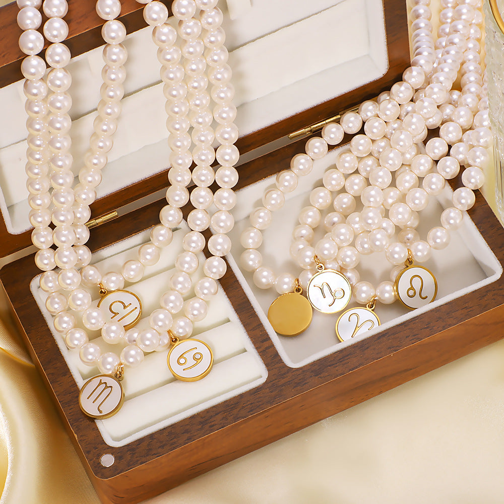 Wholesale 12 constellation stainless steel plated 18k gold white seashells pearl light luxury necklace