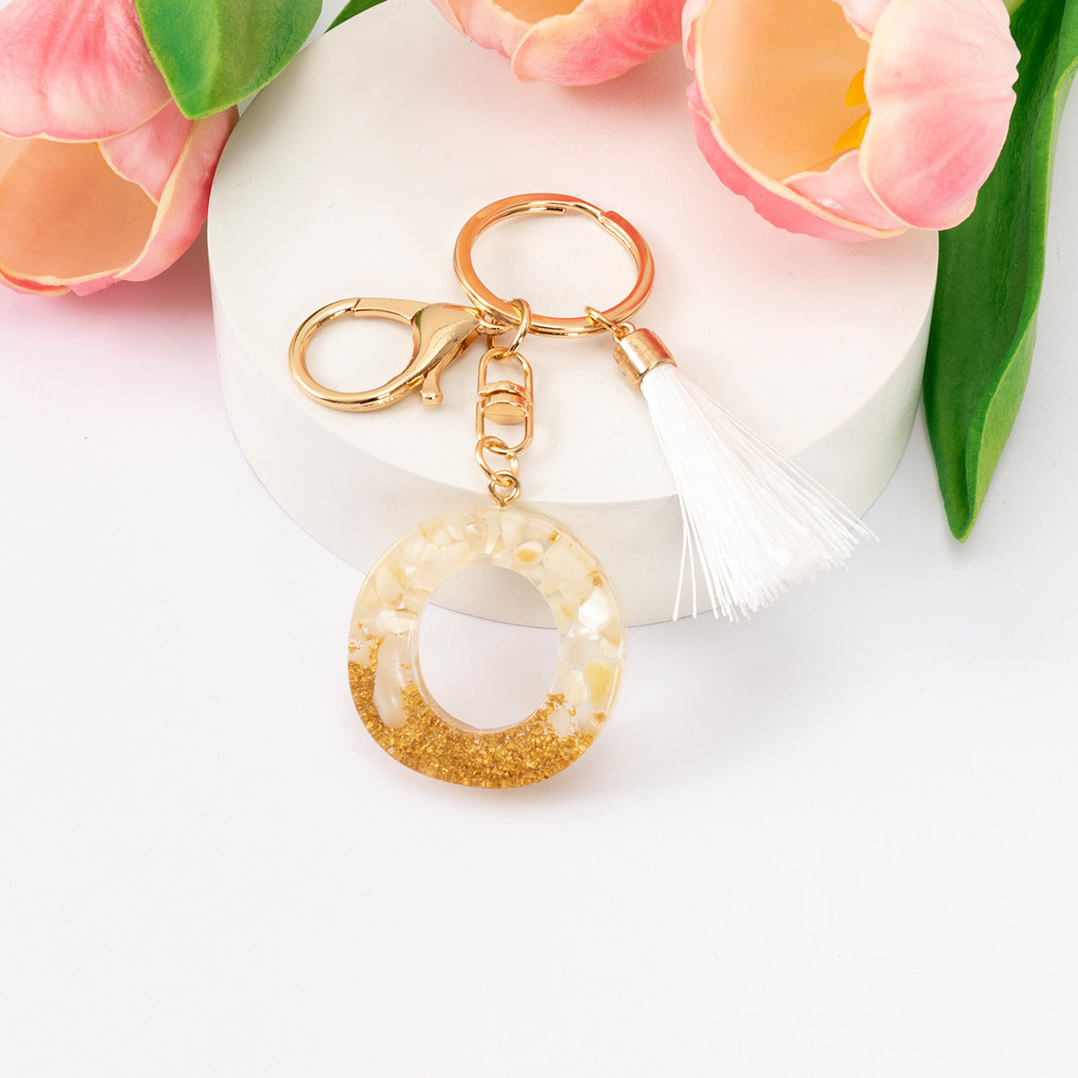 Wholesale Gold Foil New Resin Crystal Glue White Tassel Color English Digital Keychain