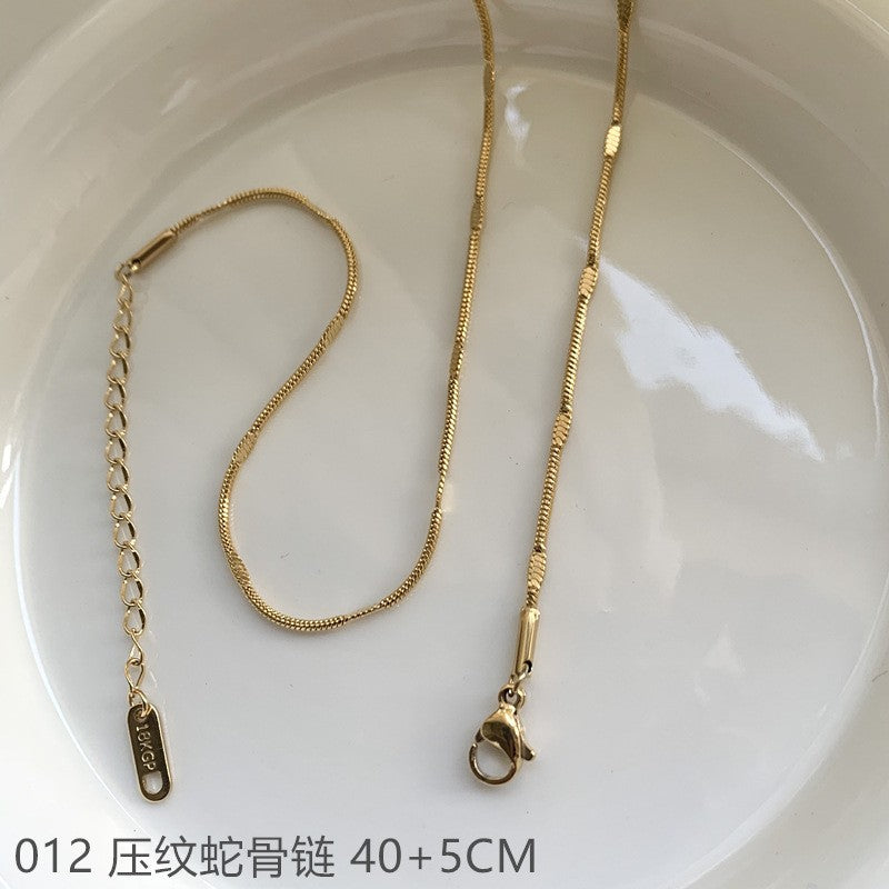 Wholesale Cross chain box chain snake bone chain titanium steel plated 24k golden sunflower clavicle chain