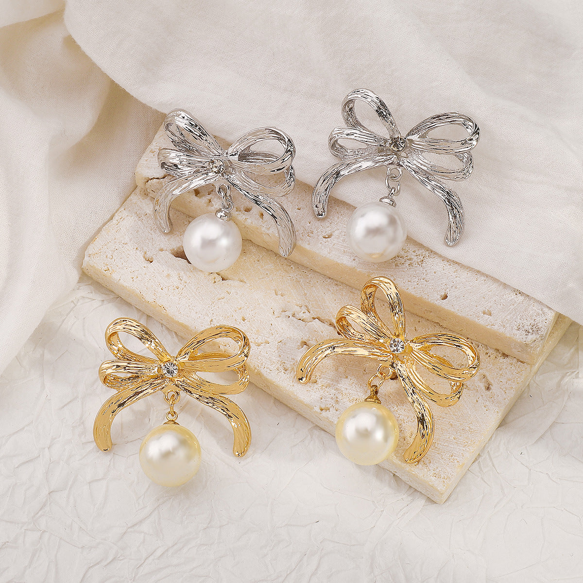 Wholesale Design Sense BowEarings Bow Pearl Earrings Sweet Simple Niche Earrings