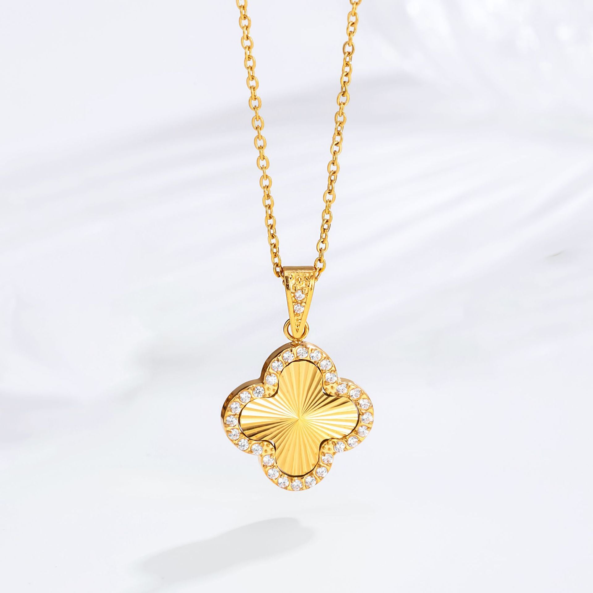 Wholesale Stainless steel zircon-set four-leaf clover necklace earrings,  and bracelet set