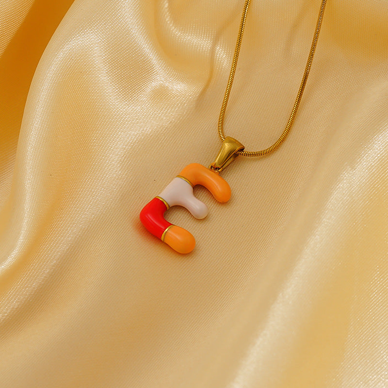 Wholesale Titanium steel oil drop 26 English letter necklace