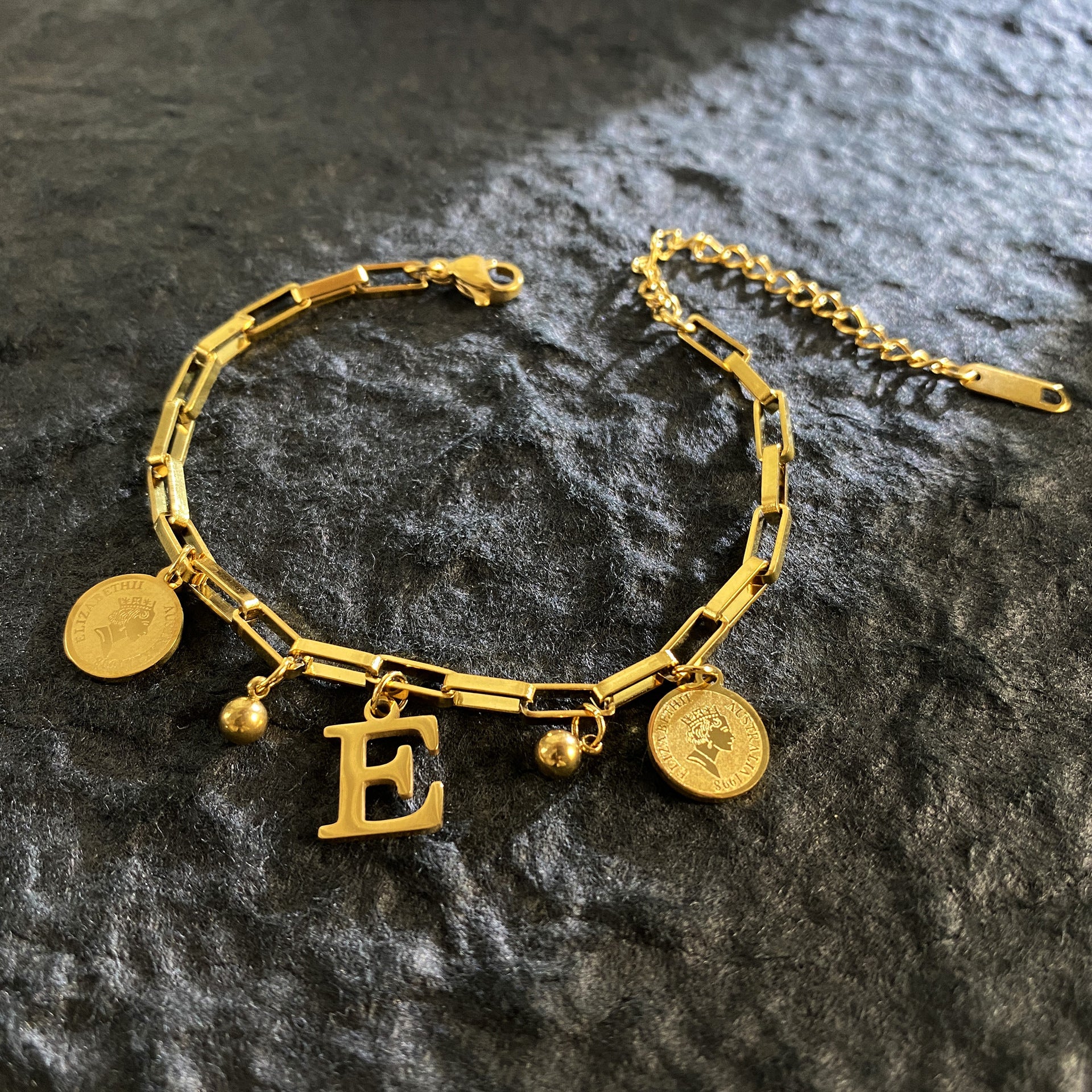 Wholesale Titanium Steel 18K Gold Plated Queen's Head Letter Bracelet ACC-BT-YuXun007