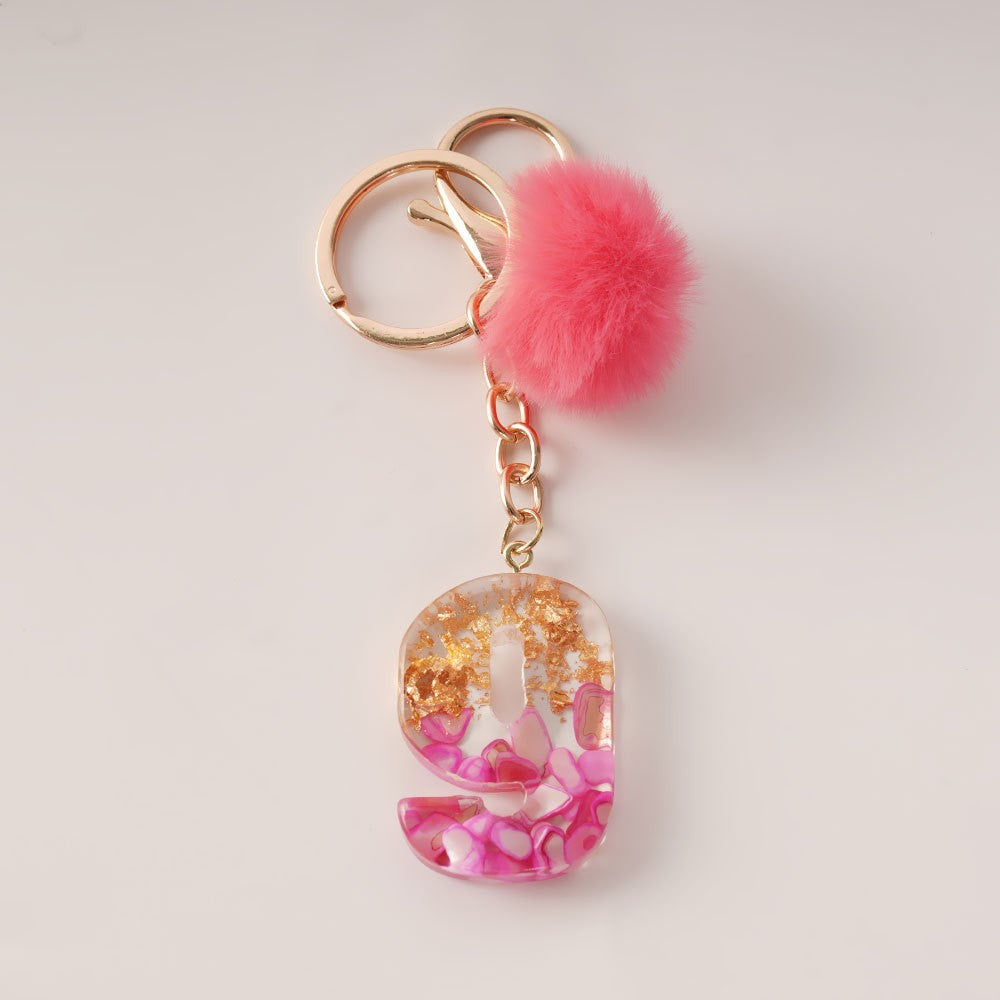 Wholesale Creative and Cute Red Fur Ball Letter Shell Handmade Glue Keychain Exquisite Pendant
