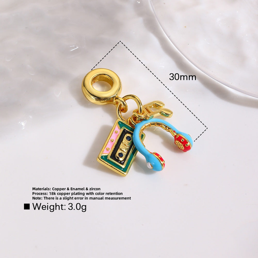 Wholesale Copper oil drop grape cola suitcase camera earphone three-piece pendant set