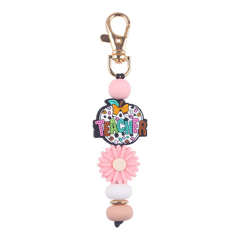 Wholesale Cartoon Teacher's Day Apple Silicone Accessories Pendant Creative DIY Four-Piece Combination Wrist Keychain