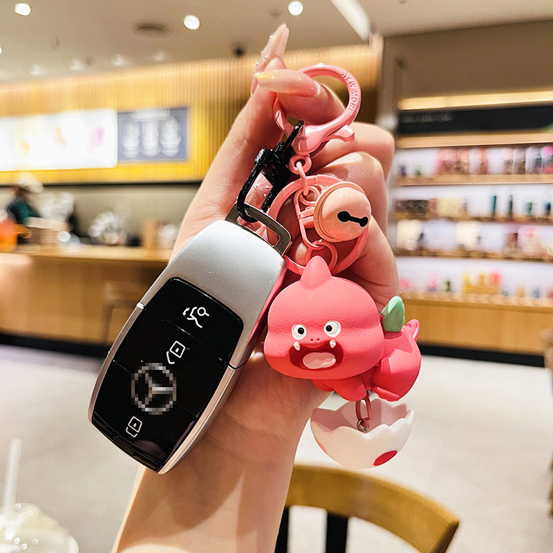 Wholesale Cartoon Dinosaur Holding Egg PVC Soft Keychain ACC-KC-HangLi002