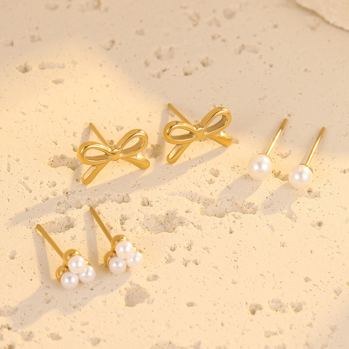 Wholesale light luxury  bow pearl stainless steel earrings