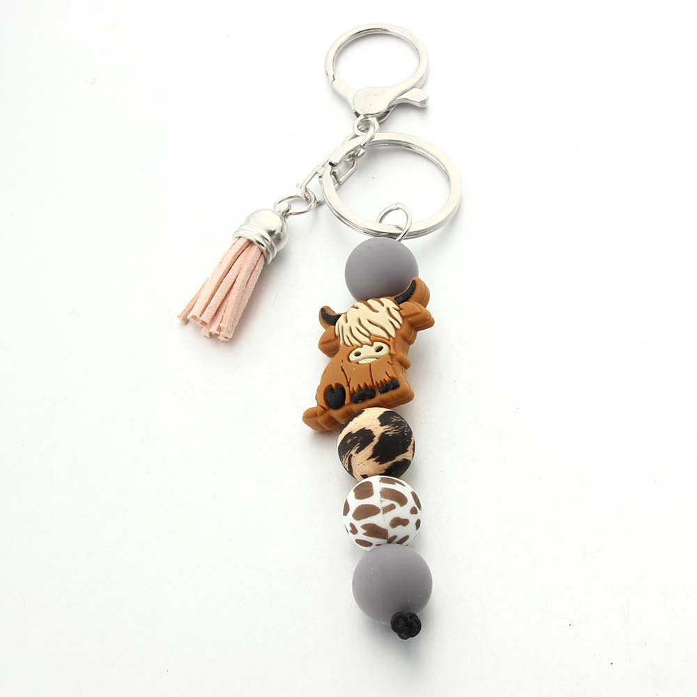 Wholesale Cartoon Cow Teeth Silicone Bead Keychain