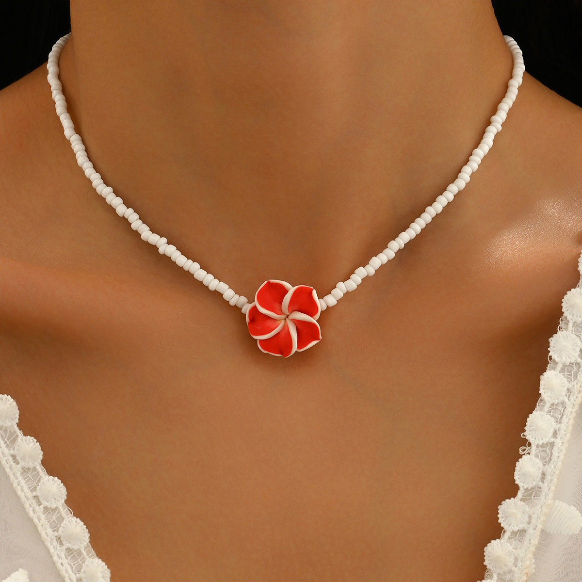 Wholesale Bohemian holiday style cute frangipani soft clay flower rice bead necklace