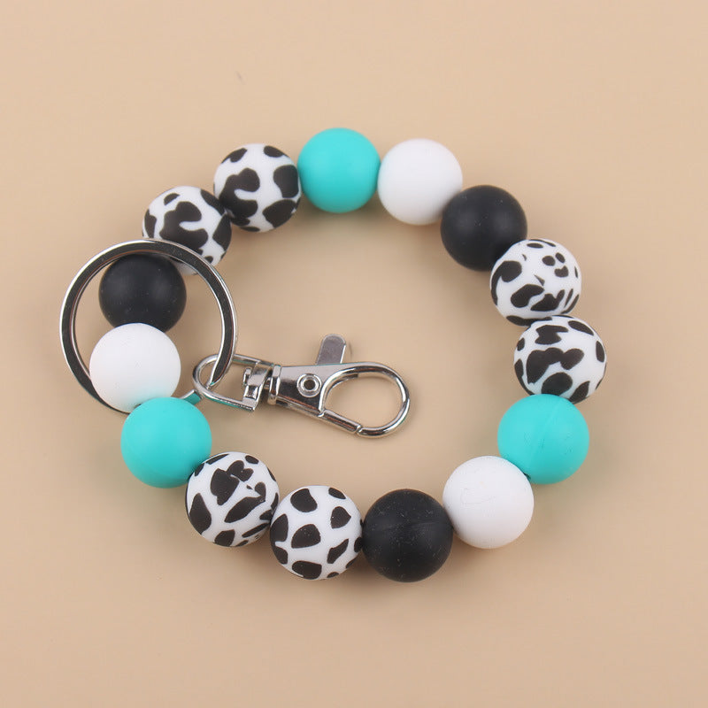 Wholesale Cow Pattern Sunflower Pattern Silicone Beaded Wrist Keychain ACC-KC-GuangTian024