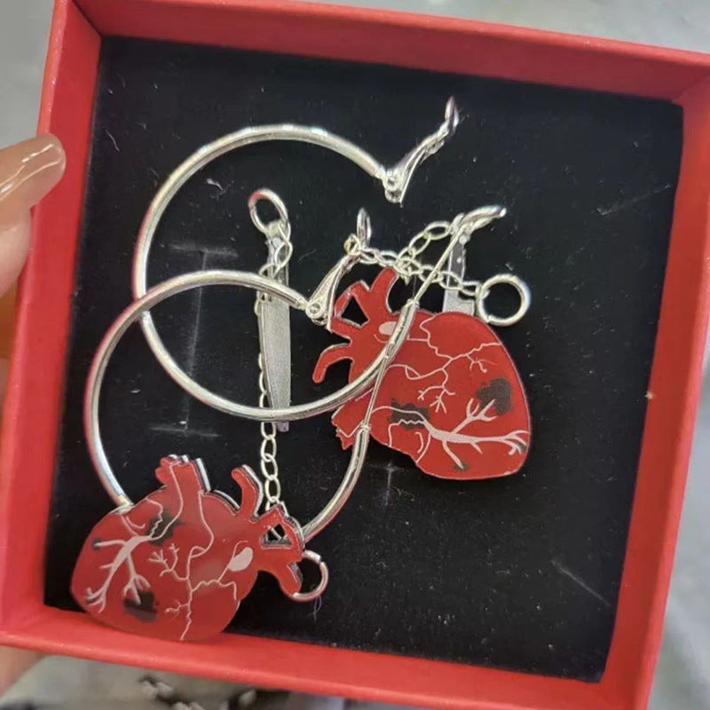 Wholesale Vintage Gothic Style Small Knife Inserted Into Beating Heart Detachable Earrings