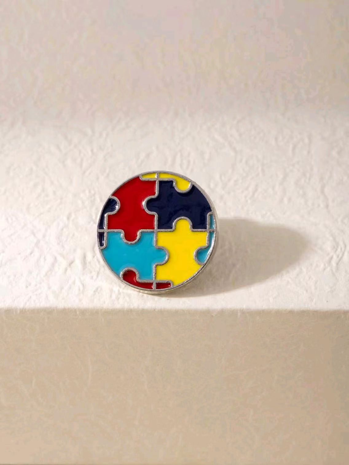 Wholesale Color-block puzzle brooch to support autism
