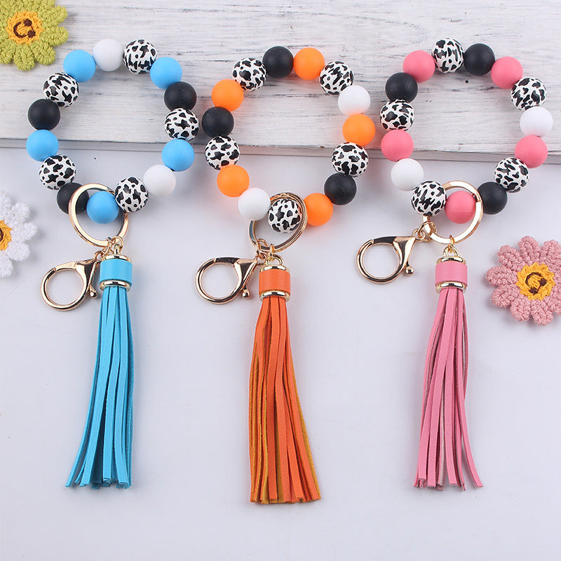 Wholesale leather PU tassel silicone beads wooden beads DIY  bracelet keychain