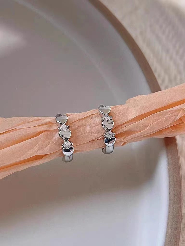 Wholesale heart inlaid zircon earrings