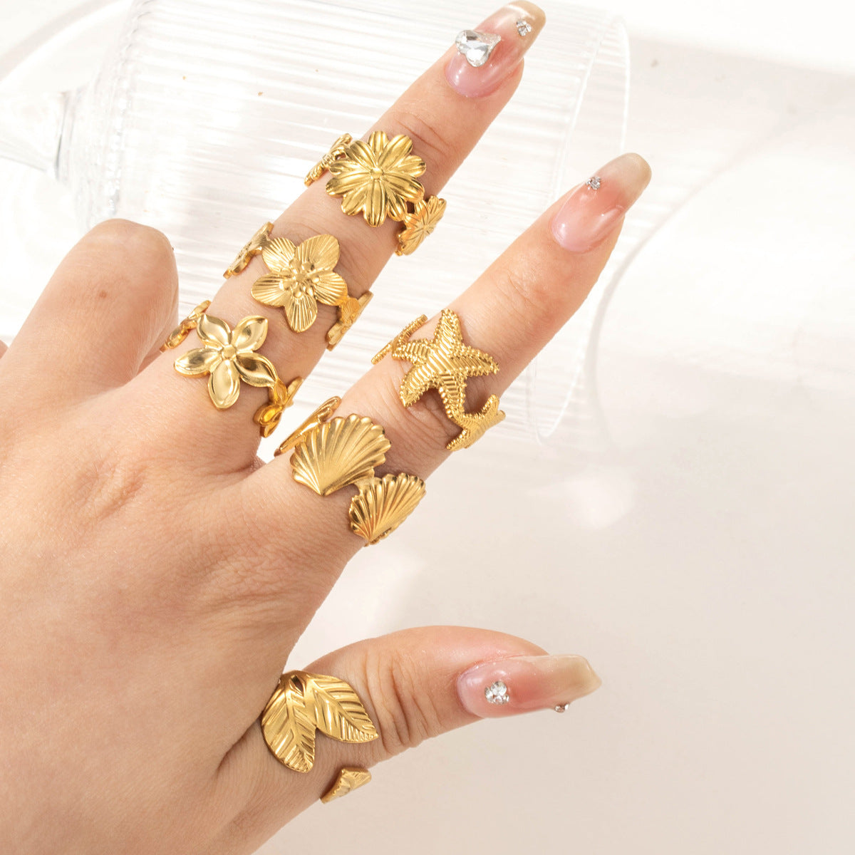 Wholesale Titanium steel simple versatile niche shell flower starfish  light luxury  opening adjustable ring