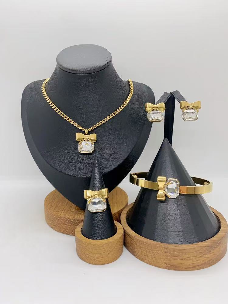 Wholesale Stainless Steel Bow Rhinestone Necklace,  Bracelet,  Earrings,  and Ring Set