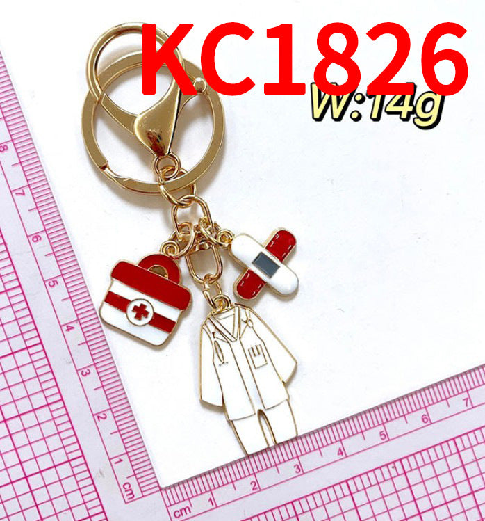 Wholesale Classic nurse cap thermometer pill mask heartbeat nurse suit zinc alloy keychain