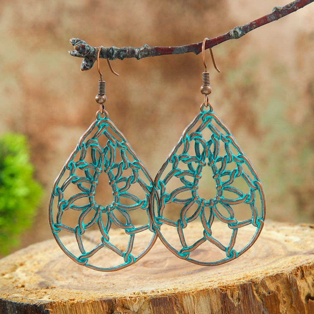 Wholesale Retro Bohemian Turquoise Heart Hollow Leaves Alloy Earrings for Party Wear Boutique Resale Jewelry