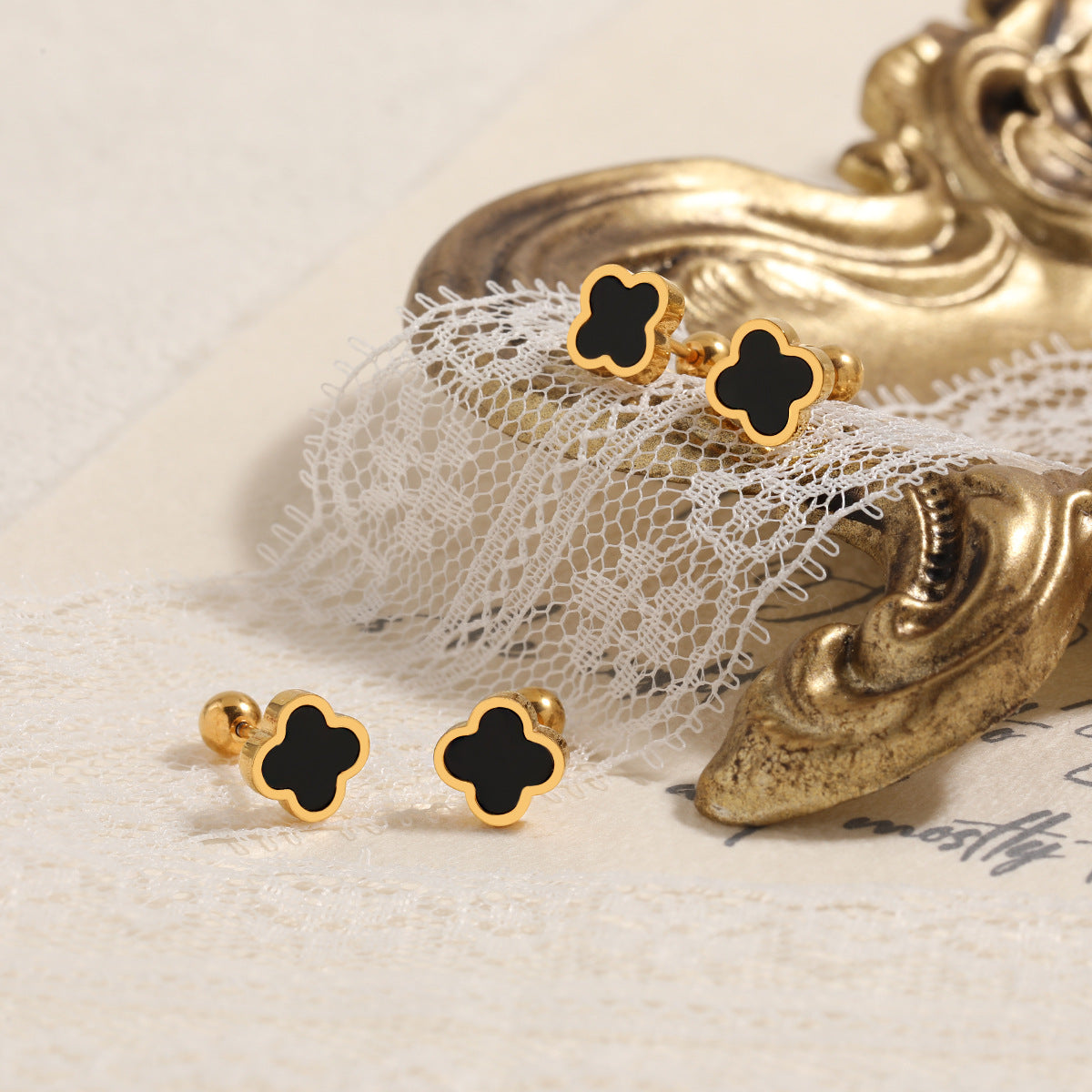 Wholesale  Luxury Glue Dropping Mini Small Four-leaf Clover Ear Bone Titanium Steel Earrings