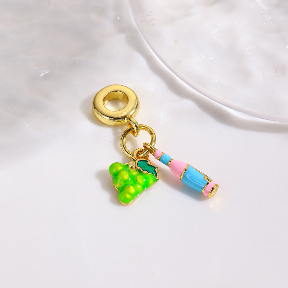 Wholesale Copper oil drop grape cola suitcase camera earphone three-piece pendant set