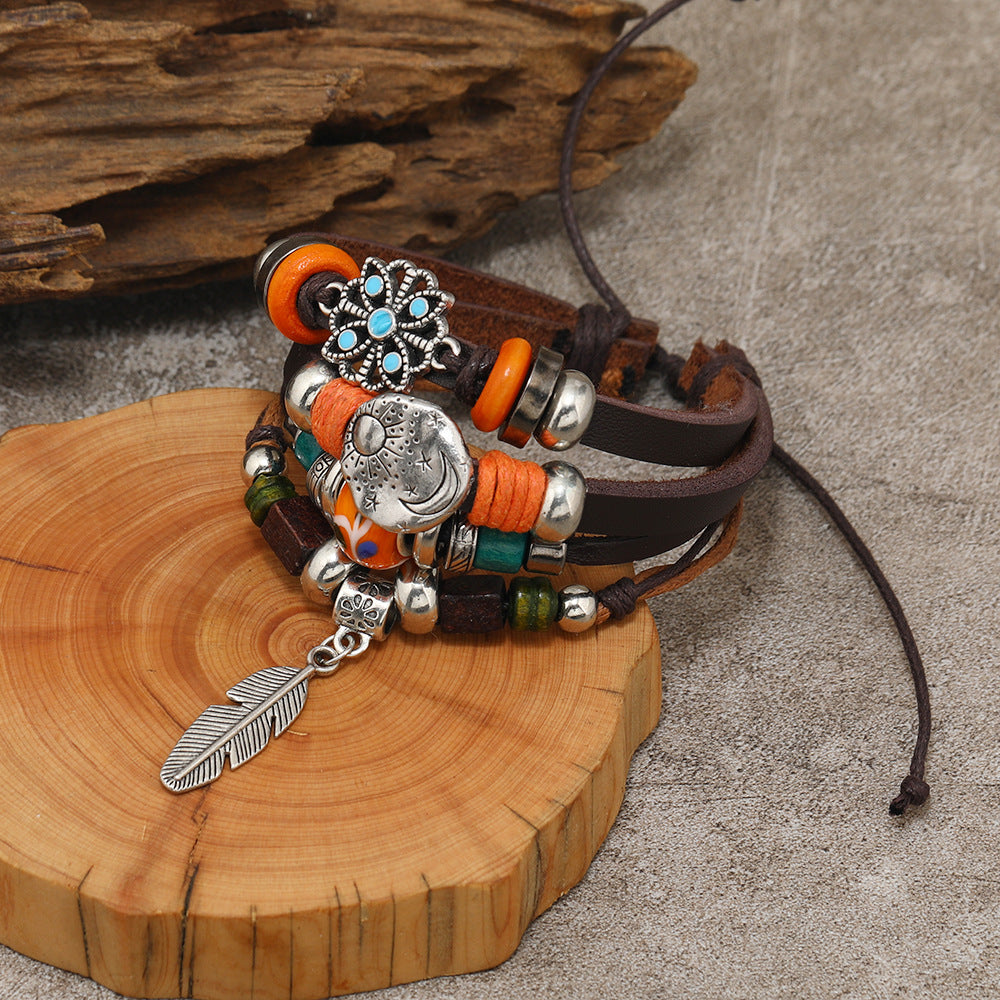 Wholesale Leather butterfly and feather pendant vintage multi-layer bracelet