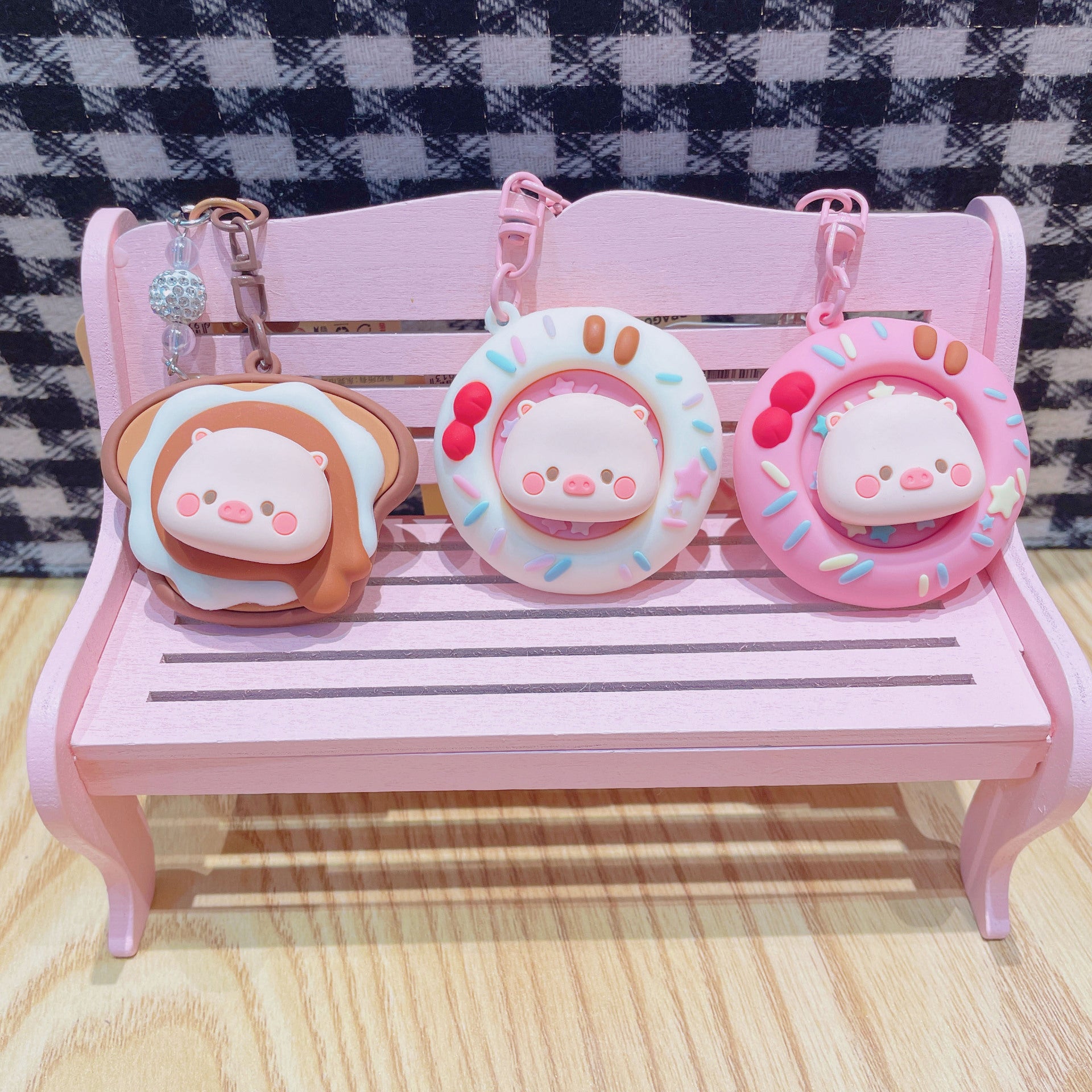 Wholesale Cute cartoon PVC pig spinning donut keychain