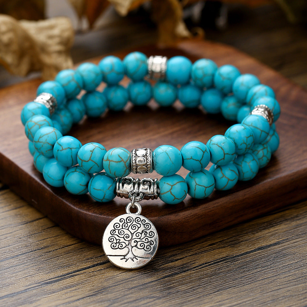 Wholesale Two 8mm turquoise bead World Tree pendant bracelets