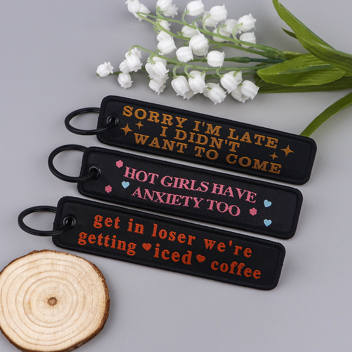 Wholesale famous quotes woven tag English letters keychain