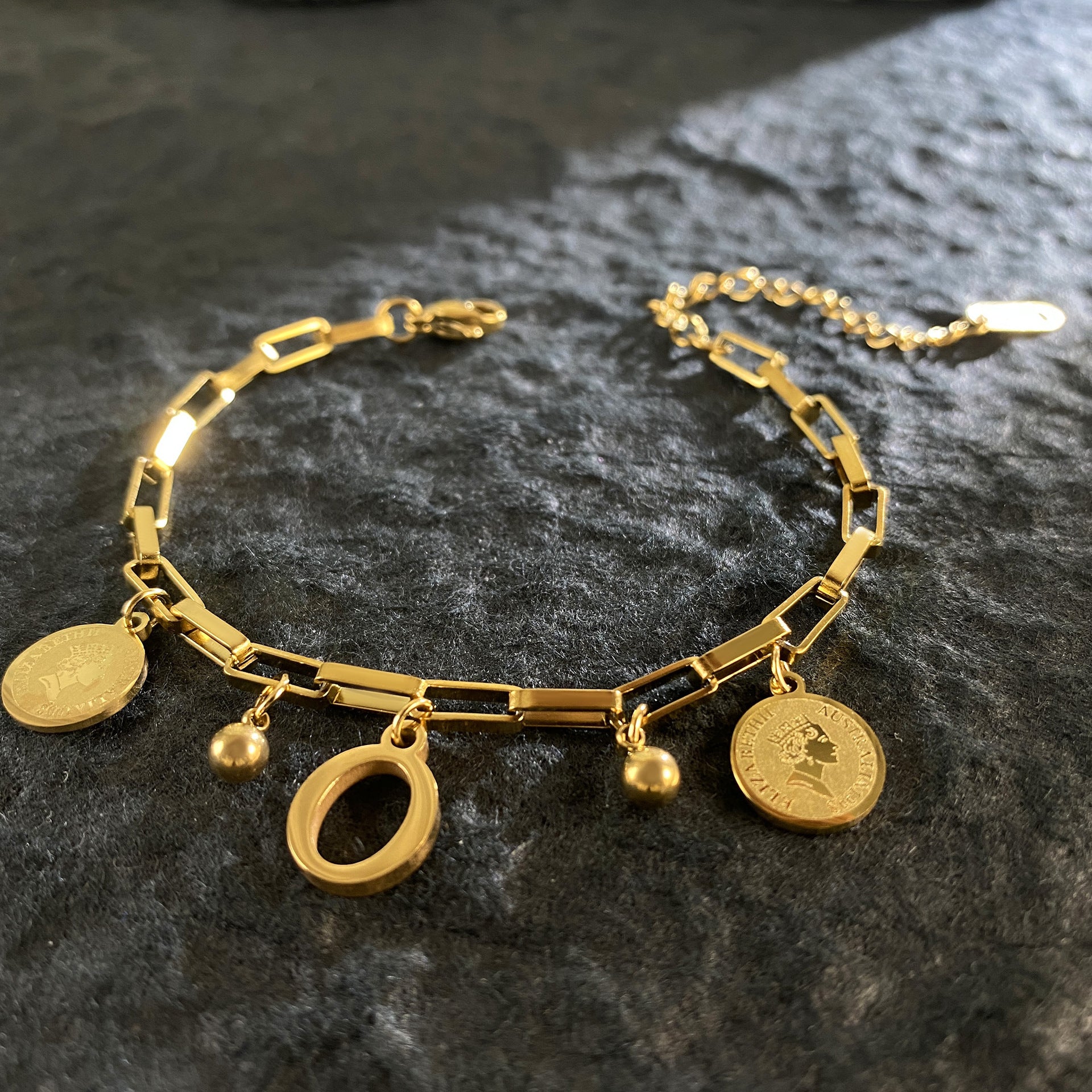 Wholesale Titanium Steel 18K Gold Plated Queen's Head Letter Bracelet ACC-BT-YuXun007