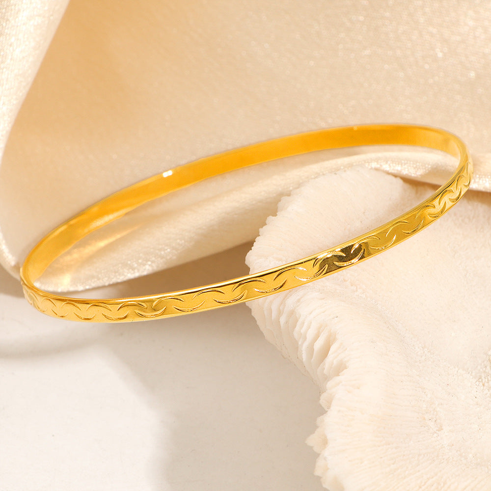Wholesale Stylish Titanium Steel Slim Bangle with Patterned Smiley Face Design