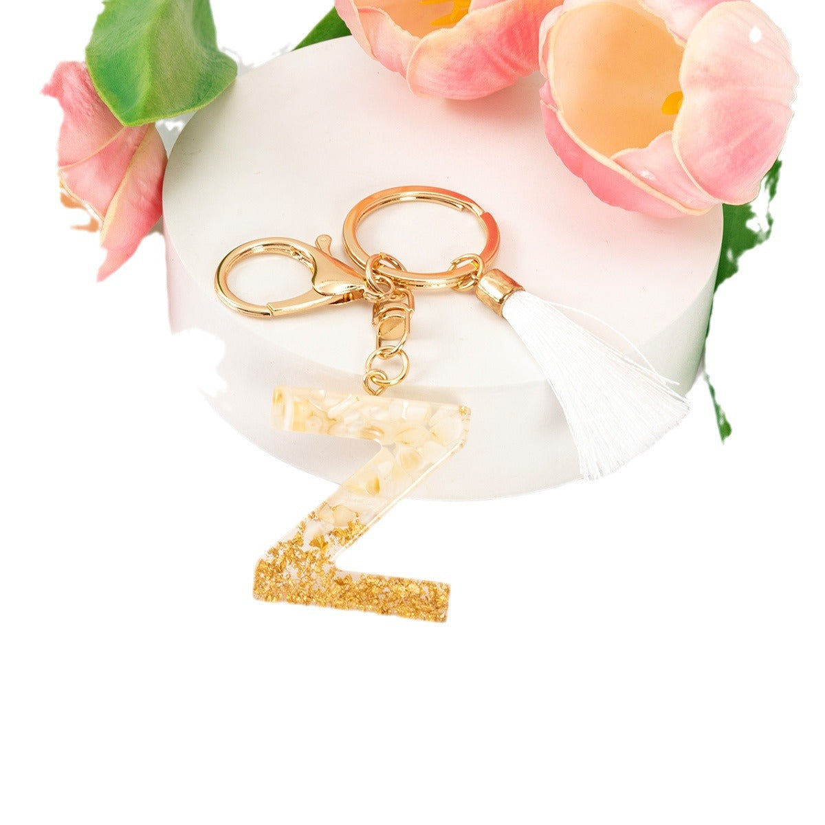 Wholesale Gold Foil New Resin Crystal Glue White Tassel Color English Digital Keychain