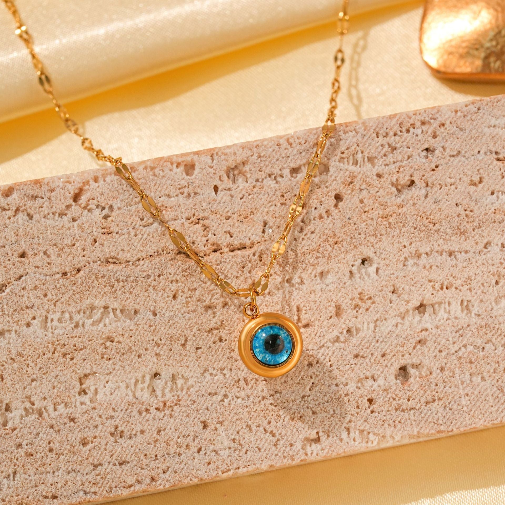 Wholesale Titanium Steel Retro Hip-hop Blue Devil's Eye Bow Love Pendant Evil Eye Necklace