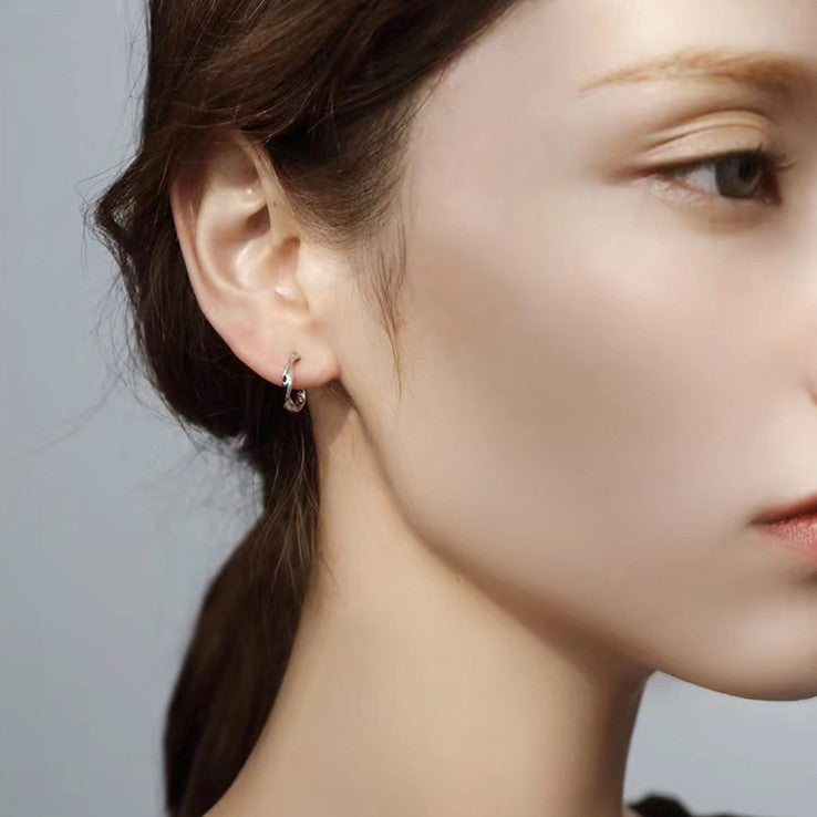 Wholesale s999 Sterling Silver Elegant Mobius Earrings Light Luxury Earrings