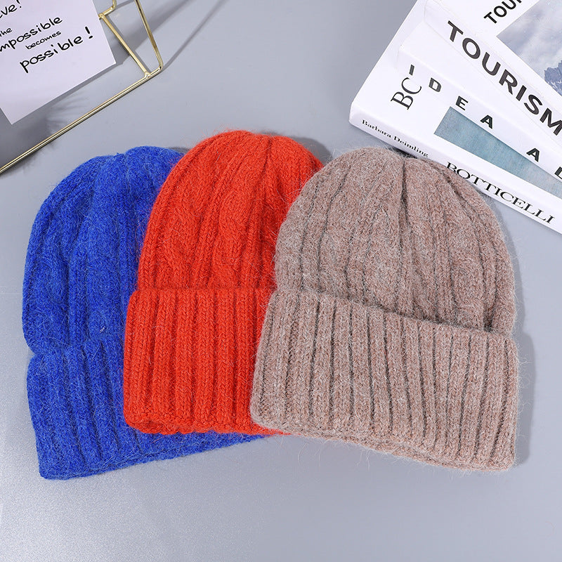 Wholesale solid color rabbit fur warm hat knitted hat twist wool hat