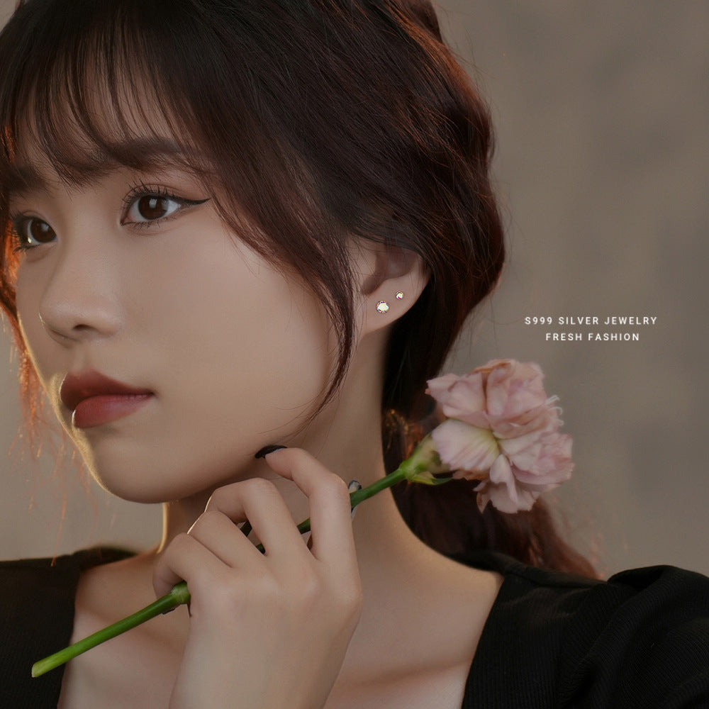 Wholesale s999 Foot Silver Magic Color Zircon Earrings